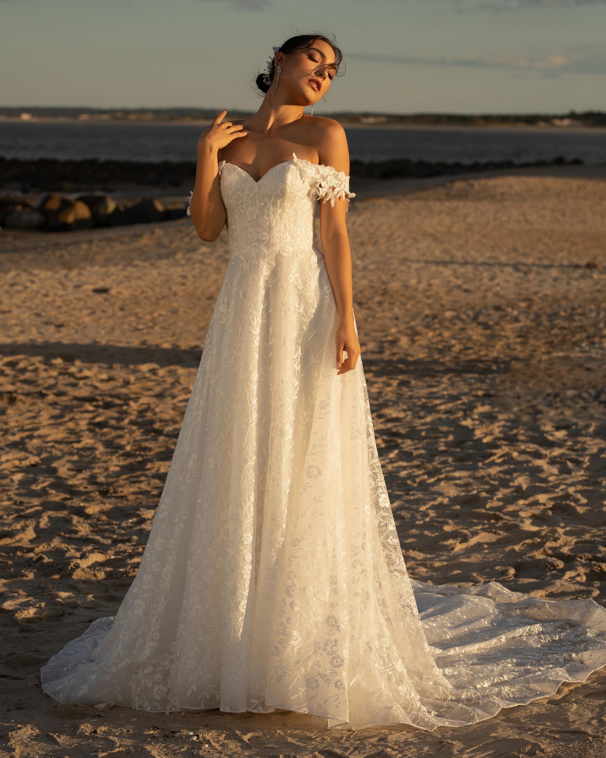 Photo of the model wearing a bridal gown